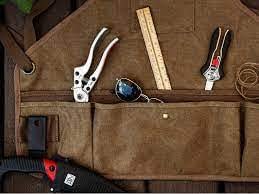 Ironwood Tool Co. 16oz Waxed Canvas Garden Tool Apron with shoulder pads, double stitched pocket, metal grommets for strap