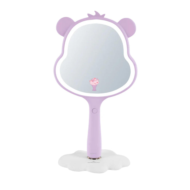 Impressions Vanity Care Bears Share Bear LED Handheld Makeup Mirror for Desk, Lighted Travel Makeup Mirror with Detachable Standing Base, Ultra Bright Adjustable Lighting and Figural Shaped (Purple) Purple