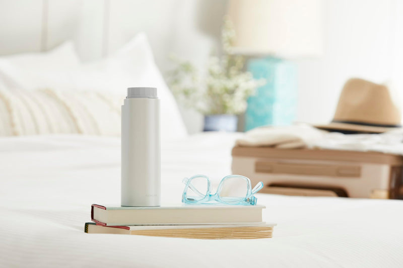 Kohler PureWash M050 Portable Bidet Sprayer,Travel Bidet, Compact Design for Easy Transport with Carrying Strap, Multi-setting Spray Functions, Holds Water for Up to One Minute, White