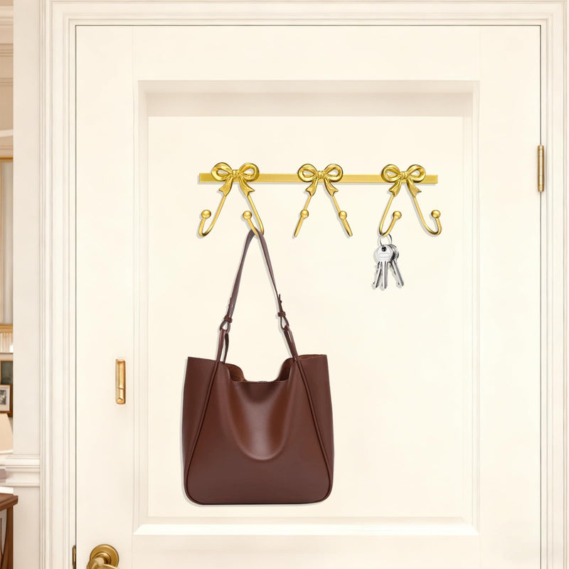 Gold Bow Wall Mounted Coat Rack, Heavy Duty Metal Bow Wall Hooks with 6 Hooks, Decorative Entryway Organizer for Robes Towels Purses Keys Gold