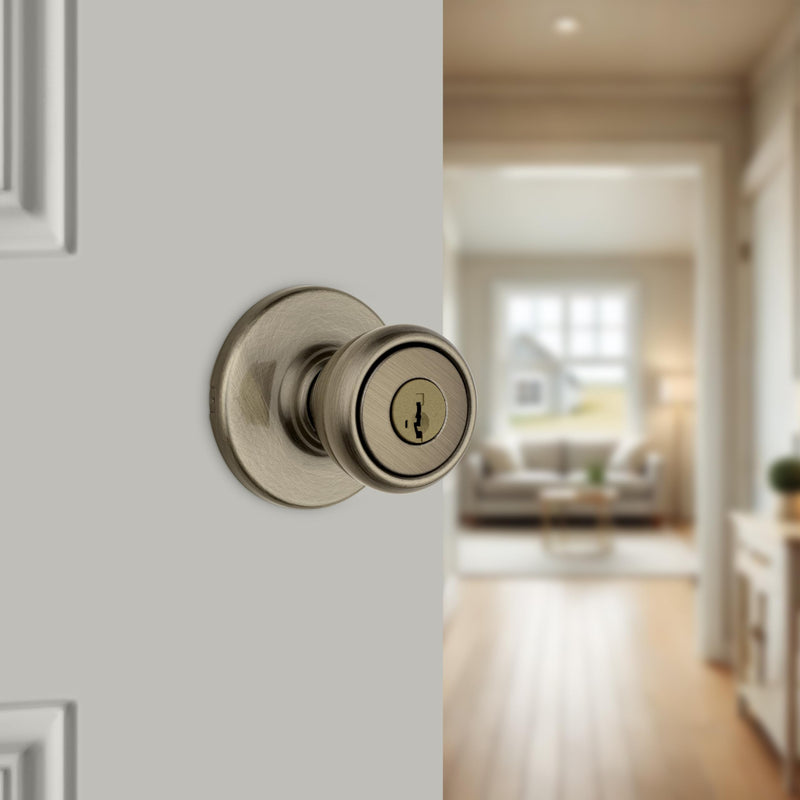 Kwikset Tylo Entry Door Knob with Lock and Key, Secure Keyed Handle Exterior, Front Entrance and Bedroom, Antique Brass, Pick Resistant SmartKey Rekey Security and Microban Updated Packaging