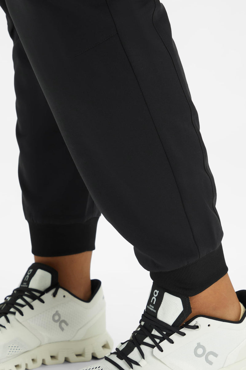 Fabletics Women's Active Scrub Jogger - MotionTech, Pocket-Packed, Lightweight, Wrinkle-Resist, Semi-Slim Fit Regular Medium Black