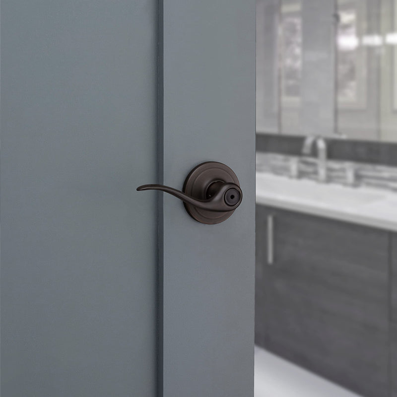 Kwikset Tustin Interior Privacy Door Handle with Lock, Door Lever For Bathroom and Bedroom, Venetian Bronze Reversible Keyless Turn Lock, with Microban Protection