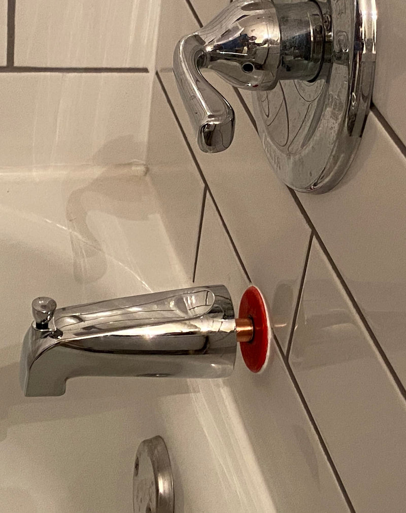 The Original Red Disc Seal. Bathtub spout rear seal. Over 6000 installed. It slips over and seals 1/2" copper pipe. Avoid 2-piece designs. 2-piece design is not sealed between the two pieces.