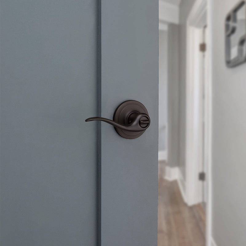 Kwikset Tustin Interior Privacy Door Handle with Lock, Door Lever For Bathroom and Bedroom, Venetian Bronze Reversible Keyless Turn Lock, with Microban Protection