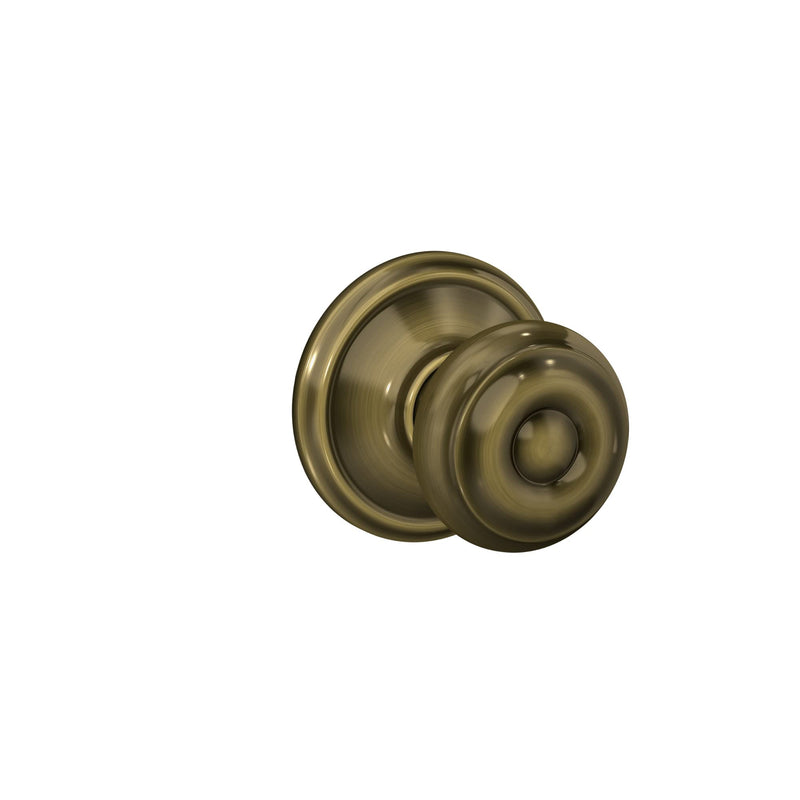 Schlage F10 GEO 609 Georgian Door Knob, Hall & Closet Passage Lock, Antique Brass Standard Packaging