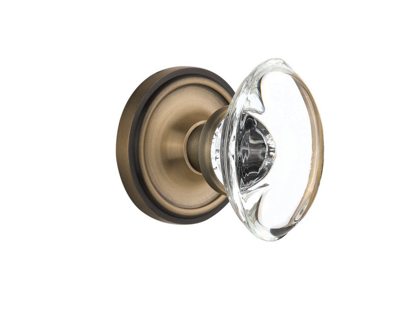 Nostalgic Warehouse Classic Rosette with Oval Clear Crystal Glass Knob, Double Dummy, Antique Brass (711512)