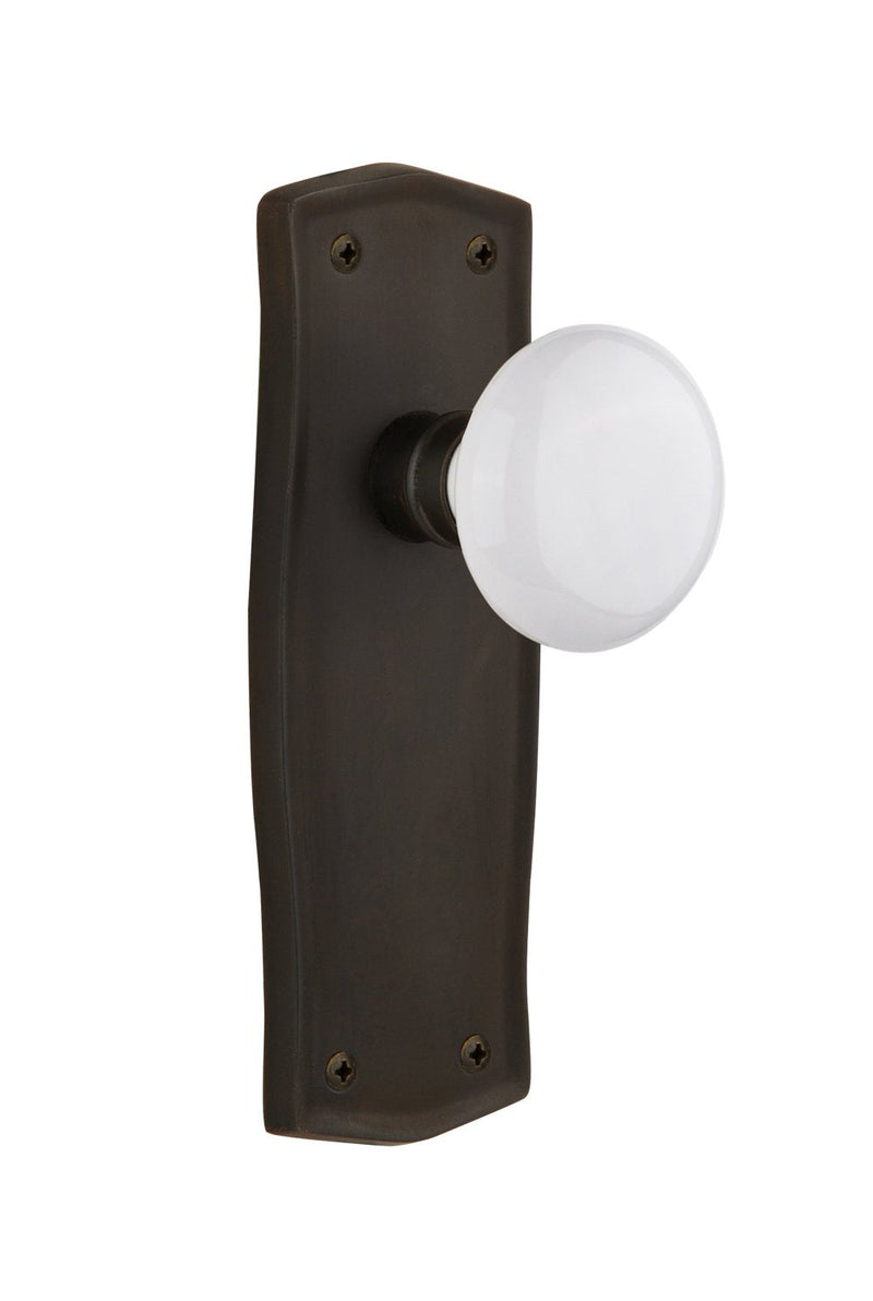 Nostalgic Warehouse Prairie Plate with White Porcelain Knob, Privacy - 2.375", Oil-Rubbed Bronze Privacy - 2.375" Oil Rubbed Bronze