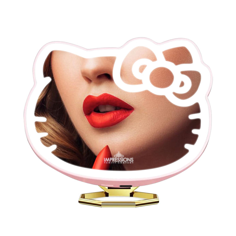 Impressions Vanity Hello Kitty 3X Magnifying Pocket Mirror with Stand, Adjustable Brightness Daylight LED Lighted Compact Makeup Mirror for Desk, Travel, Purse (Pink) Pink