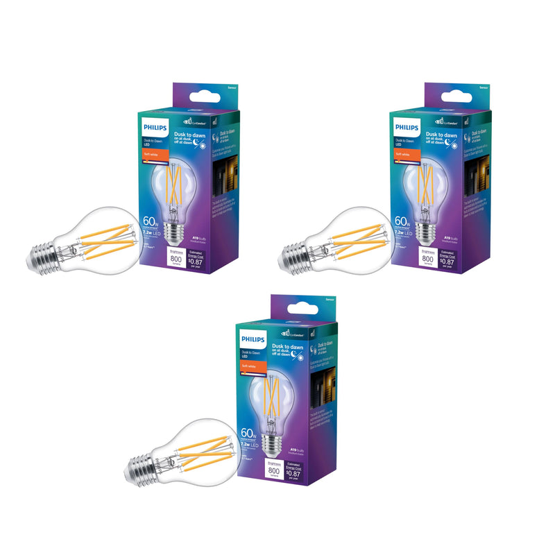 PHILIPS LED 60W A19 3-Pack Dusk to Dawn Soft White (2700K) 800 Lumen (7.2W = 60W) Clear Flicker-Free Light Bulbs 3 Pack