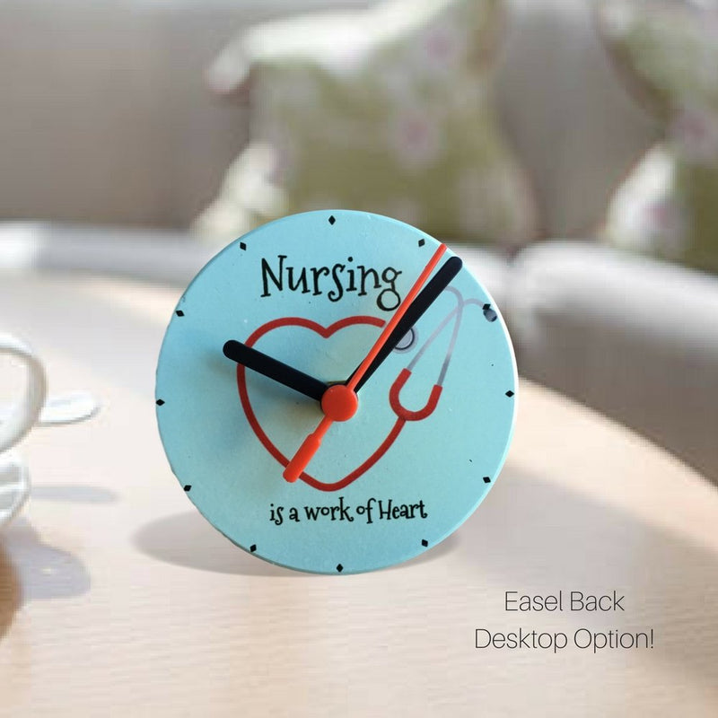 NewNest Australia - BANBERRY DESIGNS Nurse Wall or Desktop Clock - Nursing is a Work of Heart Quote - Heart Stethoscope Design - 4.25 Inches Diam 