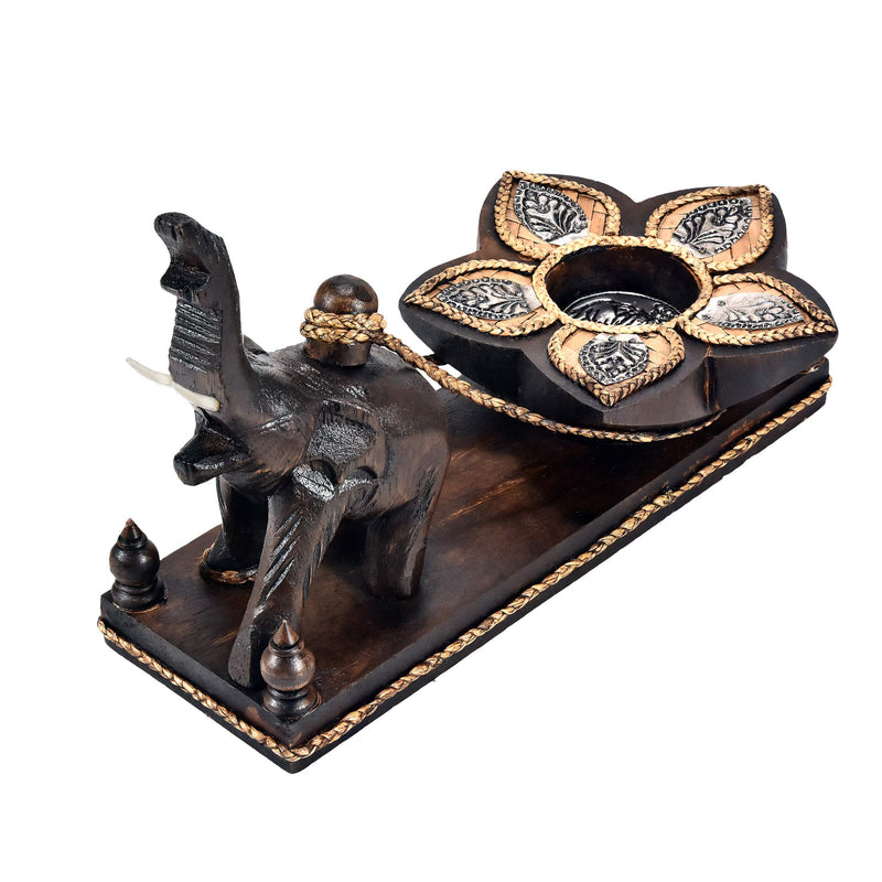 NewNest Australia - AeraVida Energetic Hand Carved Elephant Towing a Flower Candle Holder 