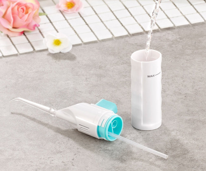 newgen medicals dental irrigator: oral irrigator with hand pump, 2.1 bar water pressure (manual oral irrigator, mouth rinse, electric toothbrush) - NewNest Australia